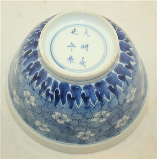 A Chinese blue and white prunus and cracked ice bowl, Chenghua six character mark, Kangxi period, diam. 15.5cm